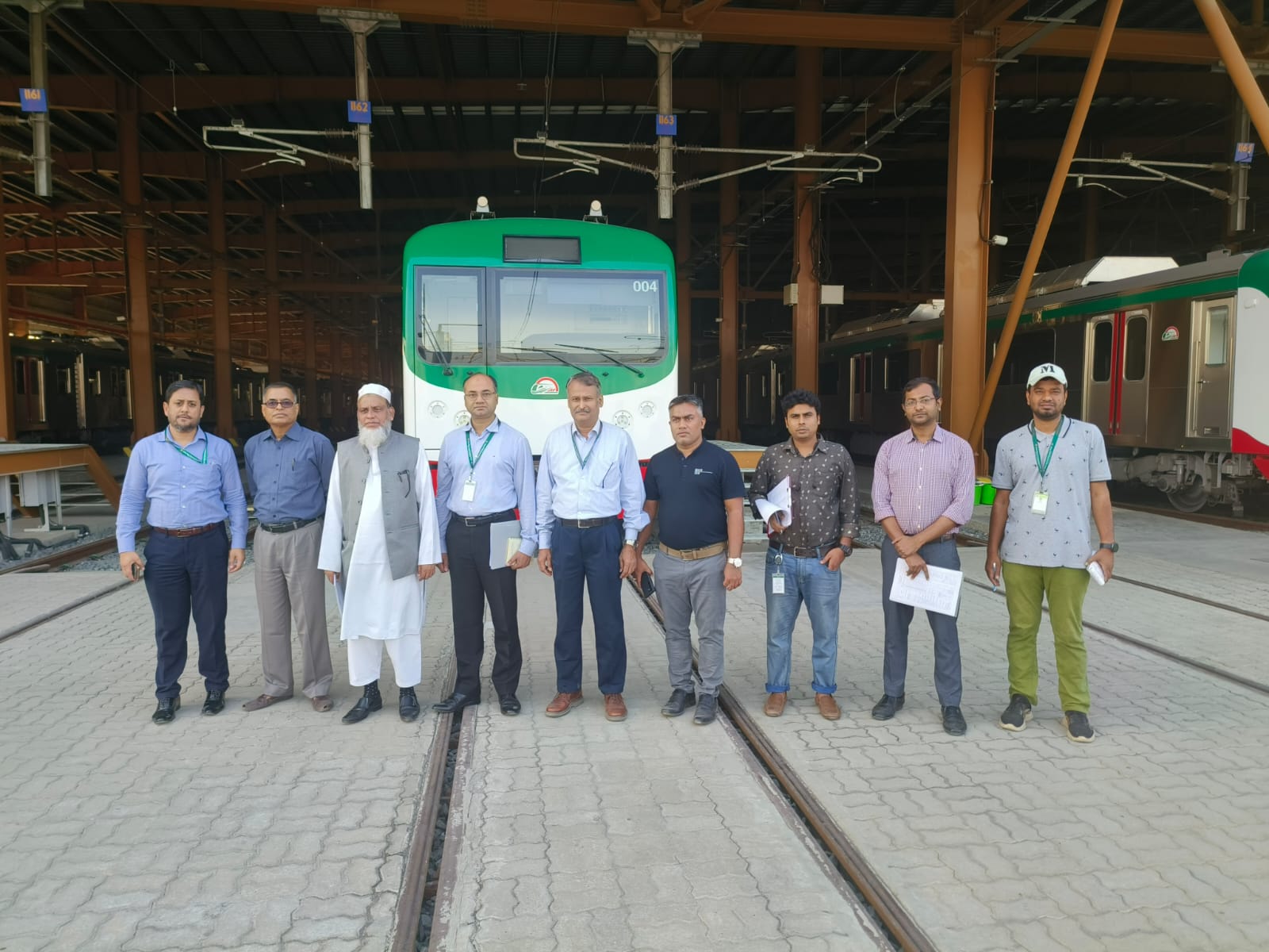 Gazzali and DMTCL team at the MRT depot